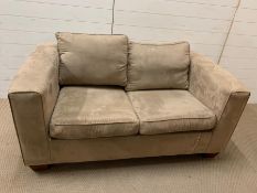 A two seater suede effect sofa bed (no mattress)