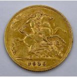 A 1910 22ct half sovereign coin.