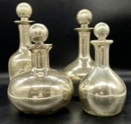 Four glass decorative decanters