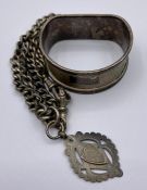 Hallmarked silver napkin ring and Albert chain.