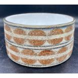 A circular Troika drum bowl with two painted bands of disc design. Painted marks, Troika, St Ives,