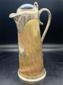 A Hallmarked Victorian horn jug with magnifying glass to top and glass base. Hallmarked for London