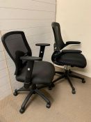 A pair of office chairs