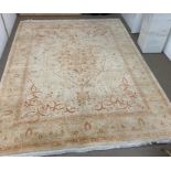 A large rug with floral border AF L320cm x W242cm
