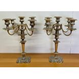 A Pair of substantial five light candelabras.