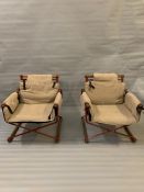 A pair of Mid Century metal directors style chairs with wooden arm rests and back with original seat