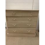 An antique painted pine chest of drawers (H96cm W105cm D50cm)