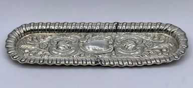A small silver tray by William Devenport, hallmarked 1927 (Total Weight 59g)