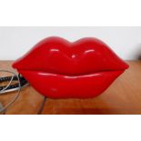 A vintage telephone red lips shaped, (22x11 cm).