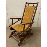 A turn Victorian mahogany rocking chair