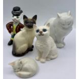 A collection of cat figures, two made by Beswick and one by Royal Copenhagen