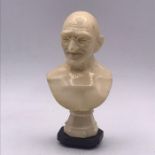 A Indian bust of Mahatma Gandhi on plinth circa 1930's