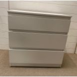 A white three drawer chest of drawers (H73cm W70cm D40cm)