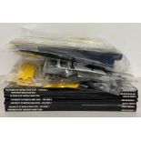 A selection of six model aircraft kits, Cessna, Tiger Shark, etc and seven books of Aircraft Archive