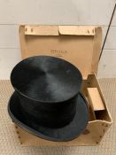 A top hat in box by Dunn and Co