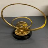 A gilt metal sculpture on base (H35cm W39cm)