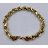 A yellow gold bracelet, marked 10k (Total Weight 12.8g)