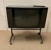 A retro Bang and Olufsen TV with remote (Untested)