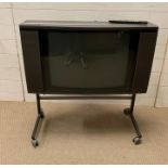 A retro Bang and Olufsen TV with remote (Untested)