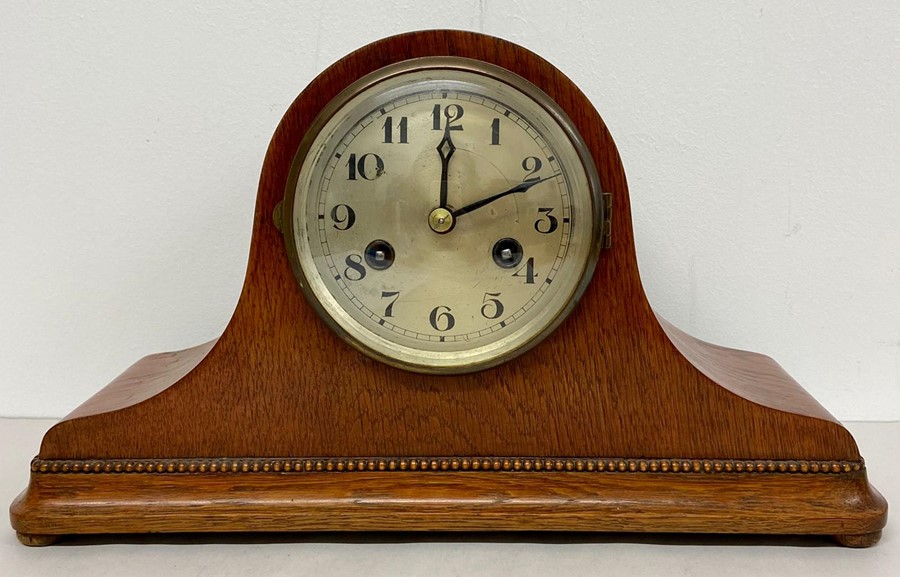 An Eight Day dome top mantle clock