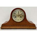 An Eight Day dome top mantle clock