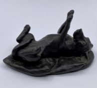 A bronze effect figure of a Labrador, signed A.N