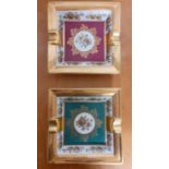 A pair of ashtrays in Limoges porcelain with gilt decorations, (3x18x18 cm). (2)