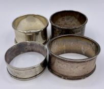 Four various silver hallmarked napkin rings (Total Weight 99g)