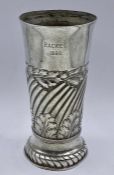 A silver vase with foliate design, hallmarked for London 1889 by F B Thomas & Co (Total Weight