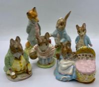 A collection of Beatrix Potter figures made by Beswick