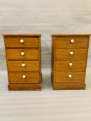 A pair of tall pine bedsides with white knobs to the four drawers (H75cm W46cm D43cm)