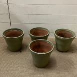 Four small glazed garden pots (H22cm Dia25cm)