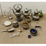 A selection of white metal teapots, milk jugs, salts and ladles