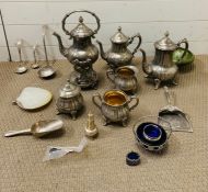 A selection of white metal teapots, milk jugs, salts and ladles