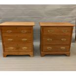A pair of pine chest of three drawers on bracket feet (H84cm W84cm D50cm)