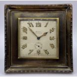 An Art Deco 'Walker & Hall' hallmarked silver Swiss desk clock, having eight day movement and