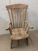 A Victorian beech and fruitwood slat back armchair