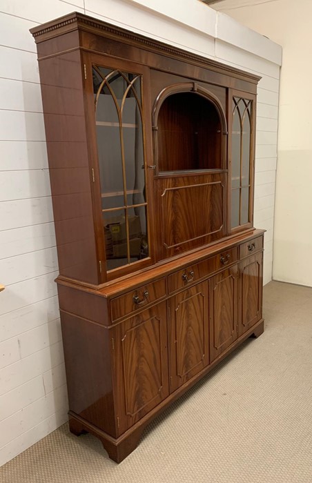 A mahogany display unit with drop down drinks cabinet and four panel cabinets below - Image 3 of 3