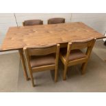 A Dinette table and four chairs (H73cm W152cm D77cm)