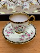 A very rare set of Royal Worcester hand painted demitasse with yellow enamel and silver gilt
