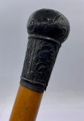 A silver topped walking cane, Birmingham 1898