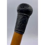 A silver topped walking cane, Birmingham 1898