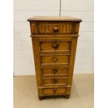 A Continental four drawer and one drop down marble interior pot cupboard.