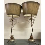 A pair of metal table lamps