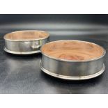 A Pair of hallmarked silver wine coasters, London hallmark, makers mark MCH