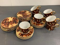 Eight Sienna Cups and saucers by Ralph Lauren and eight Sienna bread/side plates also by Ralph