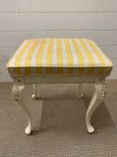 A white bedroom stool