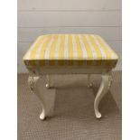 A white bedroom stool