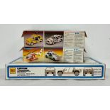 Three boxed vechile model kits, Kawasaki 1300 Police, Kawasaki 1300 Racing and Lamborghini Cheetah