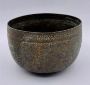 An engraved Persian bowl